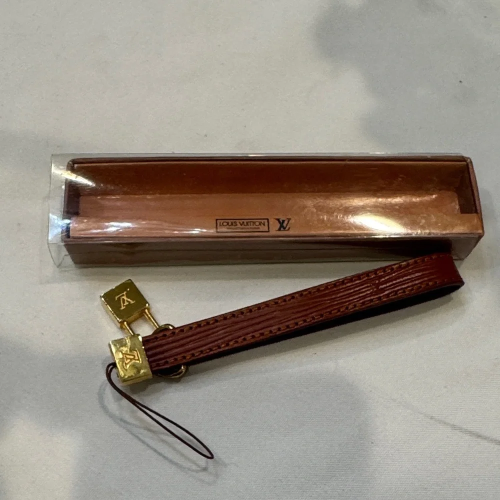 Louis Vuitton Brown Leather Key Holder with Gold Lock